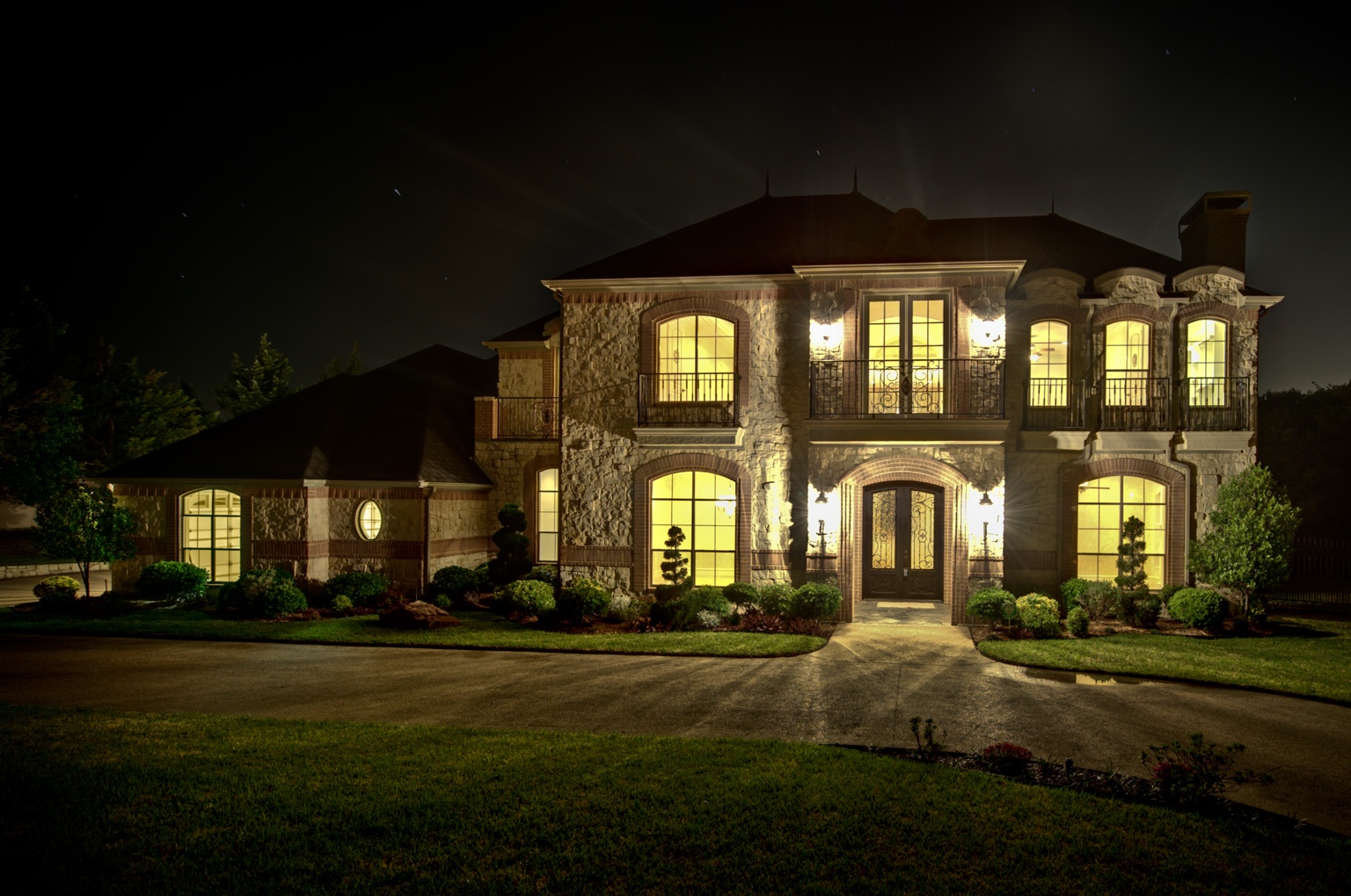 A luxury custom home at dusk